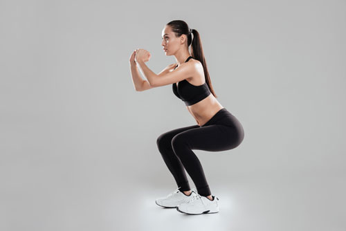 Woman performing squats